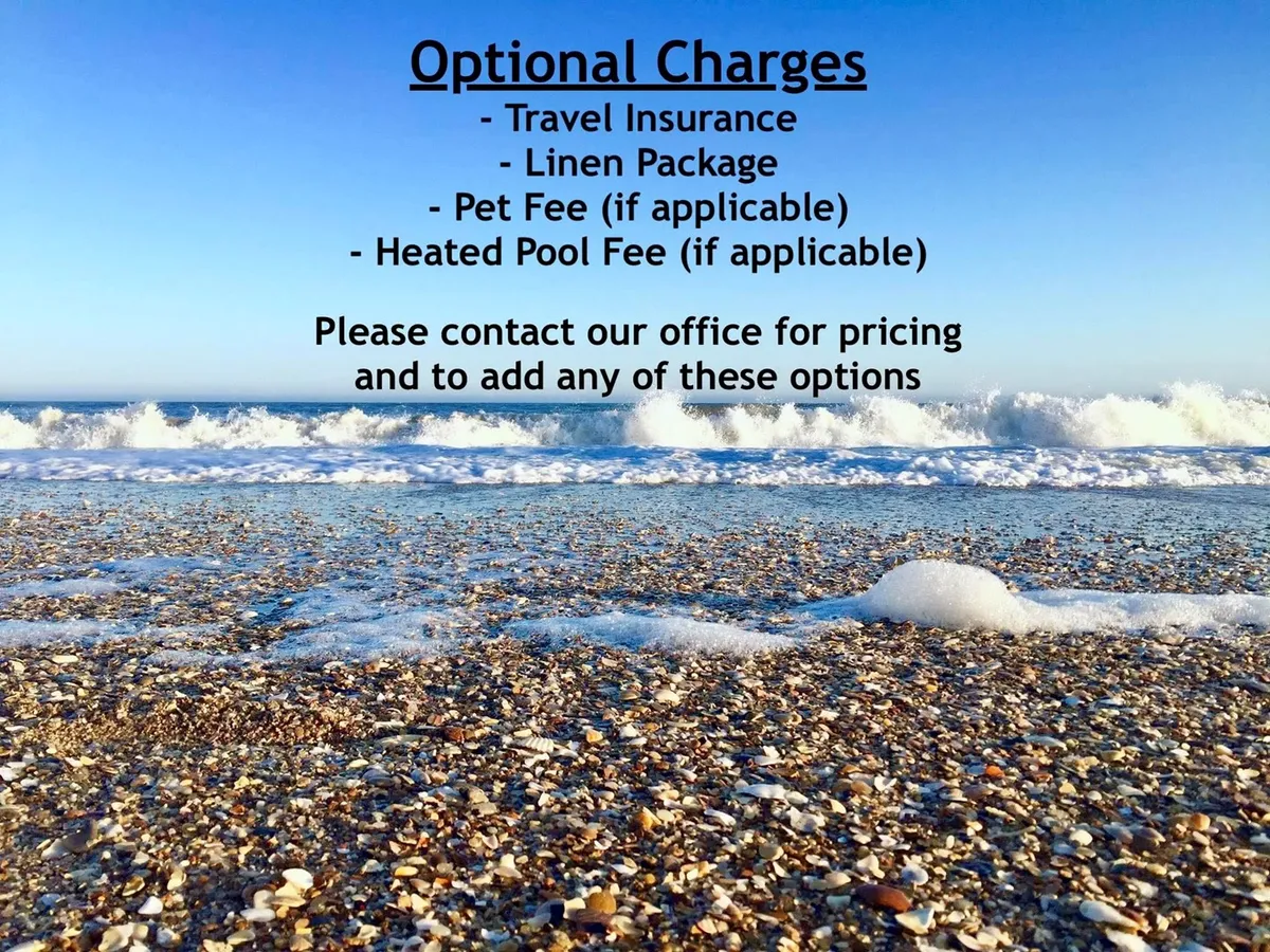 A wide, peaceful beach scene featuring gentle ocean waves rolling onto the sandy shore, with seashells scattered about. The open space invites leisurely strolls, sunbathing, and intimate moments by the water.